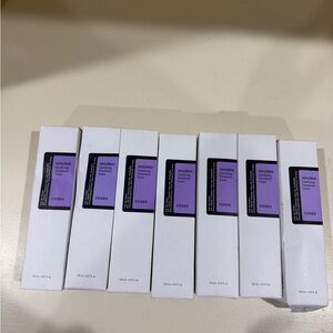 COS AHA/BHA Clarifying Treatment Toner in White and Purple